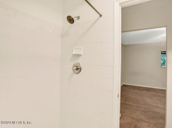 85 Debarry Avenue, Unit 1066 Orange Park, FL 32073 - Photo 24 of 24 a bathroom with a shower