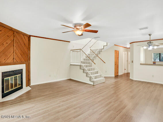 85 Debarry Avenue, Unit 1066 Orange Park, FL 32073 - Photo 8 of 24 a view of an empty room with a fireplace