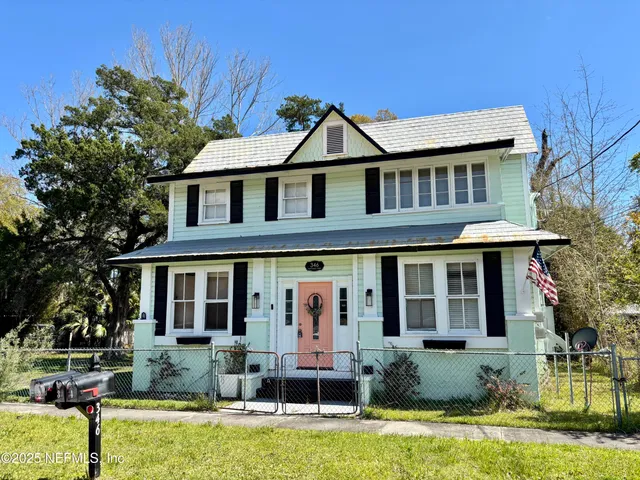 a front view of house with yard