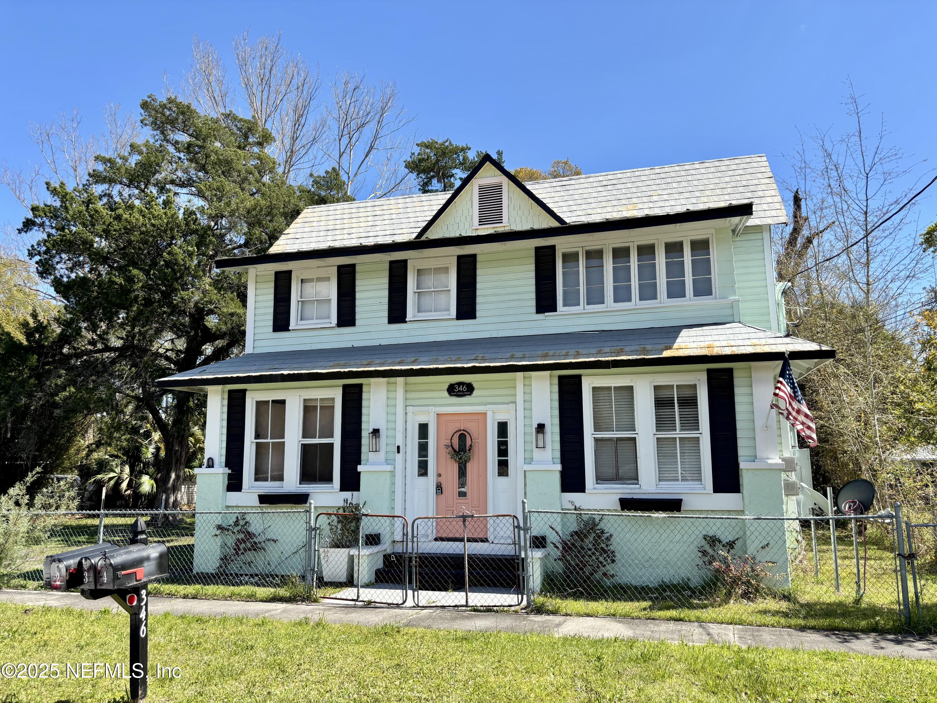 a front view of house with yard
