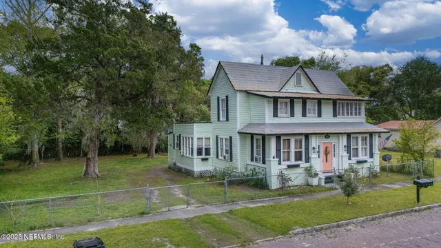 a bathroom with a shower and a bath tub