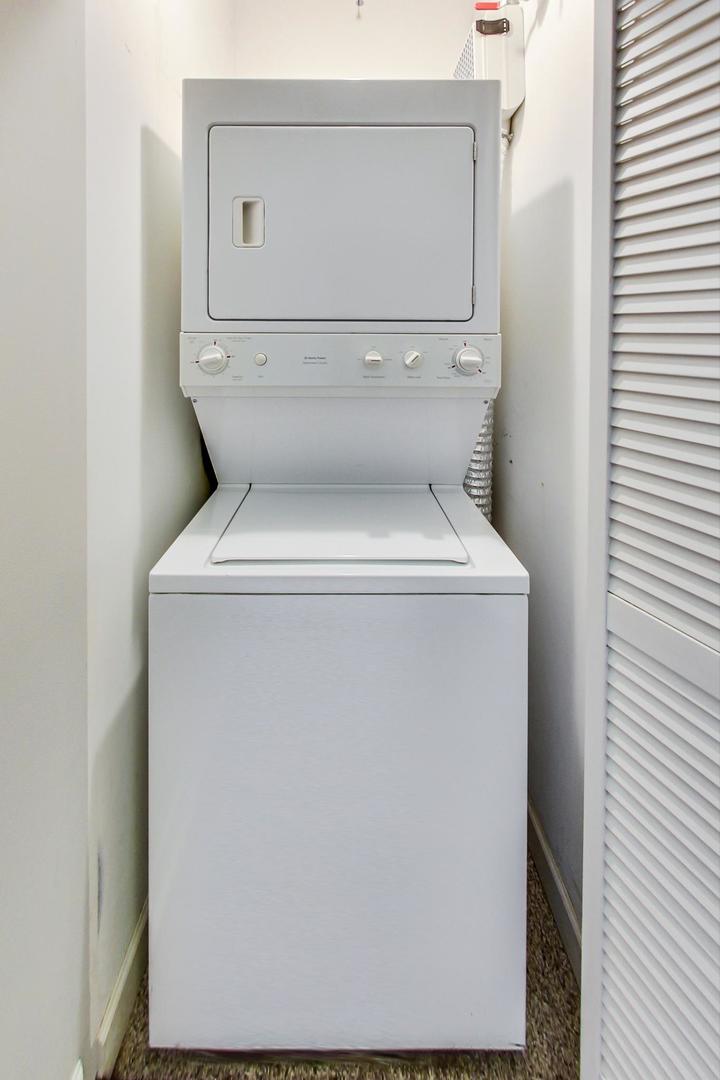 1301 West Madison Street, Unit 511 Chicago, IL 60607 - Photo 19 of 24 a close up of a washer and dryer