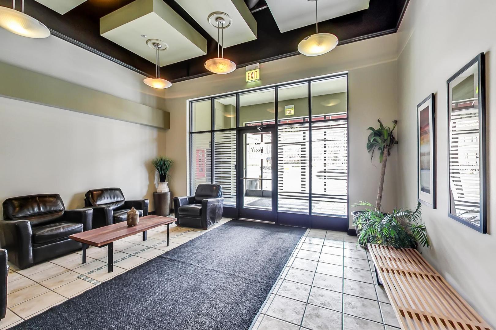 1301 West Madison Street, Unit 511 Chicago, IL 60607 - Photo 21 of 24 a living room with furniture