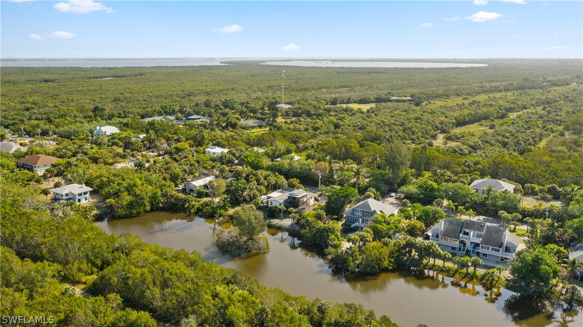 785 Rabbit Road Sanibel, FL 33957 - Photo 20 of 20 a view of a lake with houses