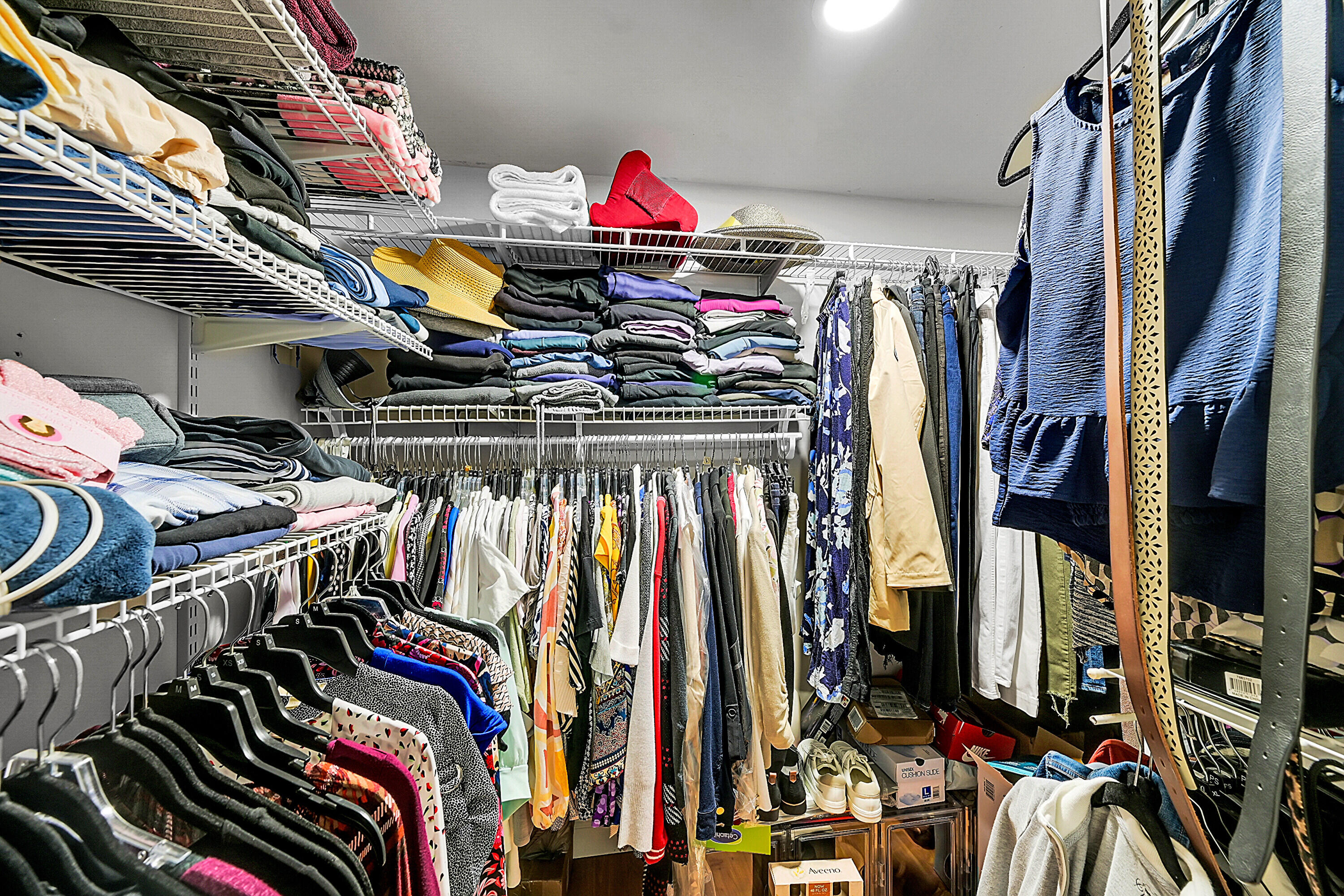 2900 Southwest 22nd Avenue, Unit 512 Delray Beach, FL 33445 - Photo 16 of 25 a view of walk in closet with clothes