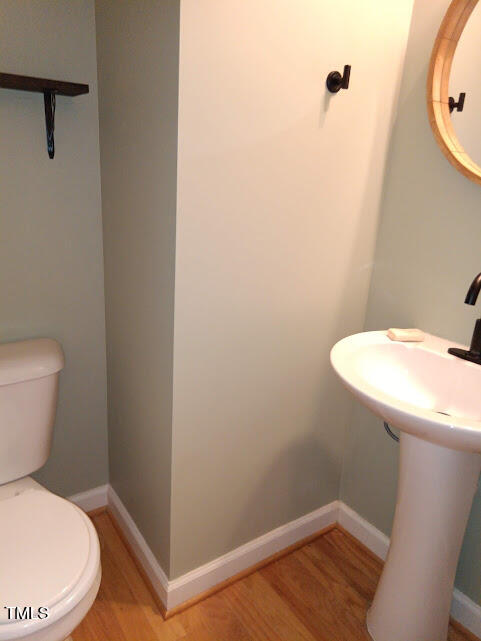 8014 Beech Tree Ridge Trail Raleigh, NC 27612 - Photo 10 of 26 Main Level Half Bath off of Kitchen.