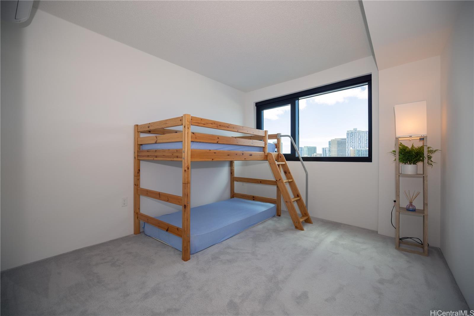 615 Keawe Street, Unit 2408 Honolulu, HI 96813 - Photo 11 of 16 a view of an empty room with stairs