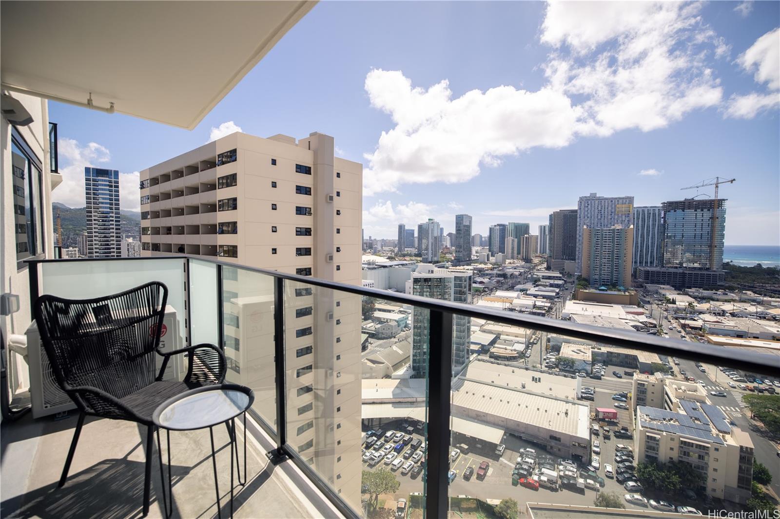 615 Keawe Street, Unit 2408 Honolulu, HI 96813 - Photo 15 of 16 a city view from a balcony