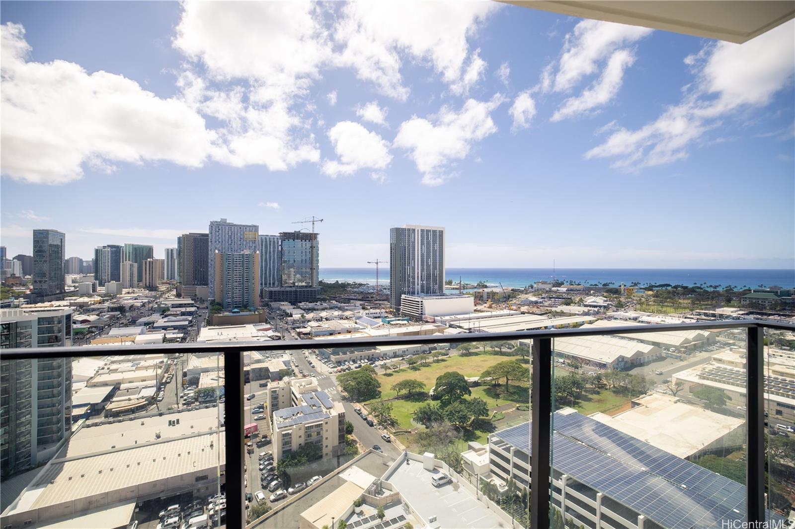 615 Keawe Street, Unit 2408 Honolulu, HI 96813 - Photo 16 of 16 a view of a city with a lake