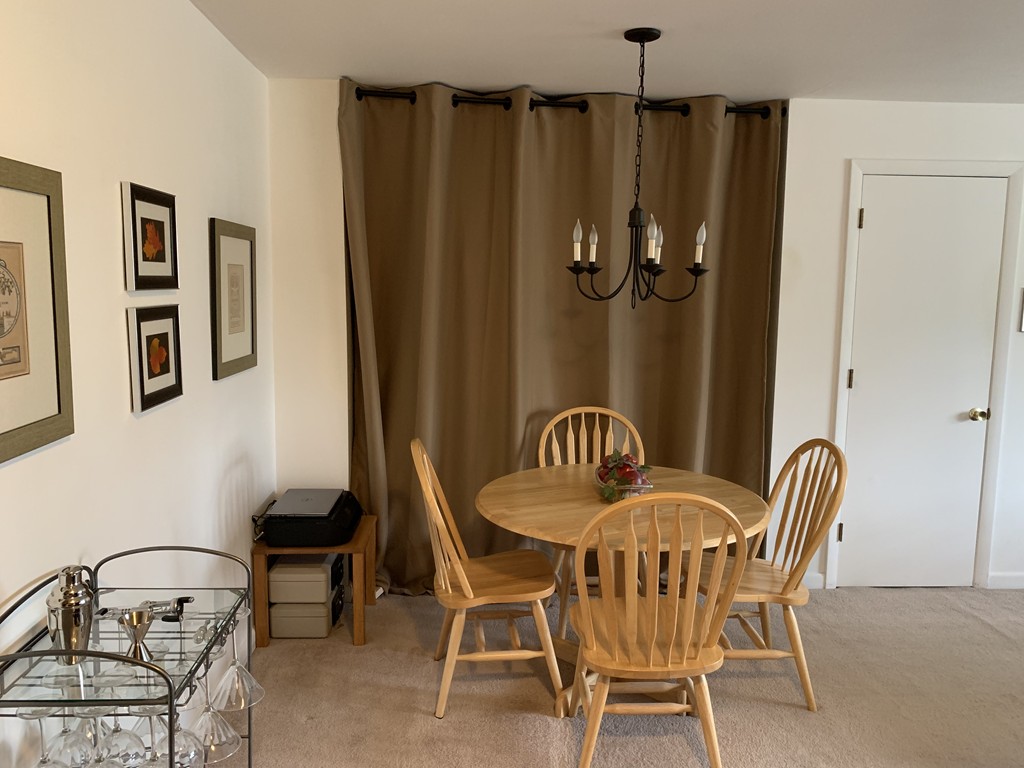 64 Jacqueline Road, Unit 12 Waltham, MA 02452 - Photo 12 of 16 a view of a dining room with furniture