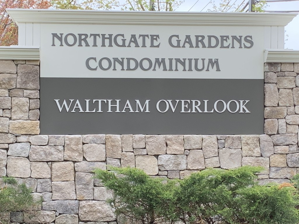 64 Jacqueline Road, Unit 12 Waltham, MA 02452 - Photo 2 of 16 a view of street sign