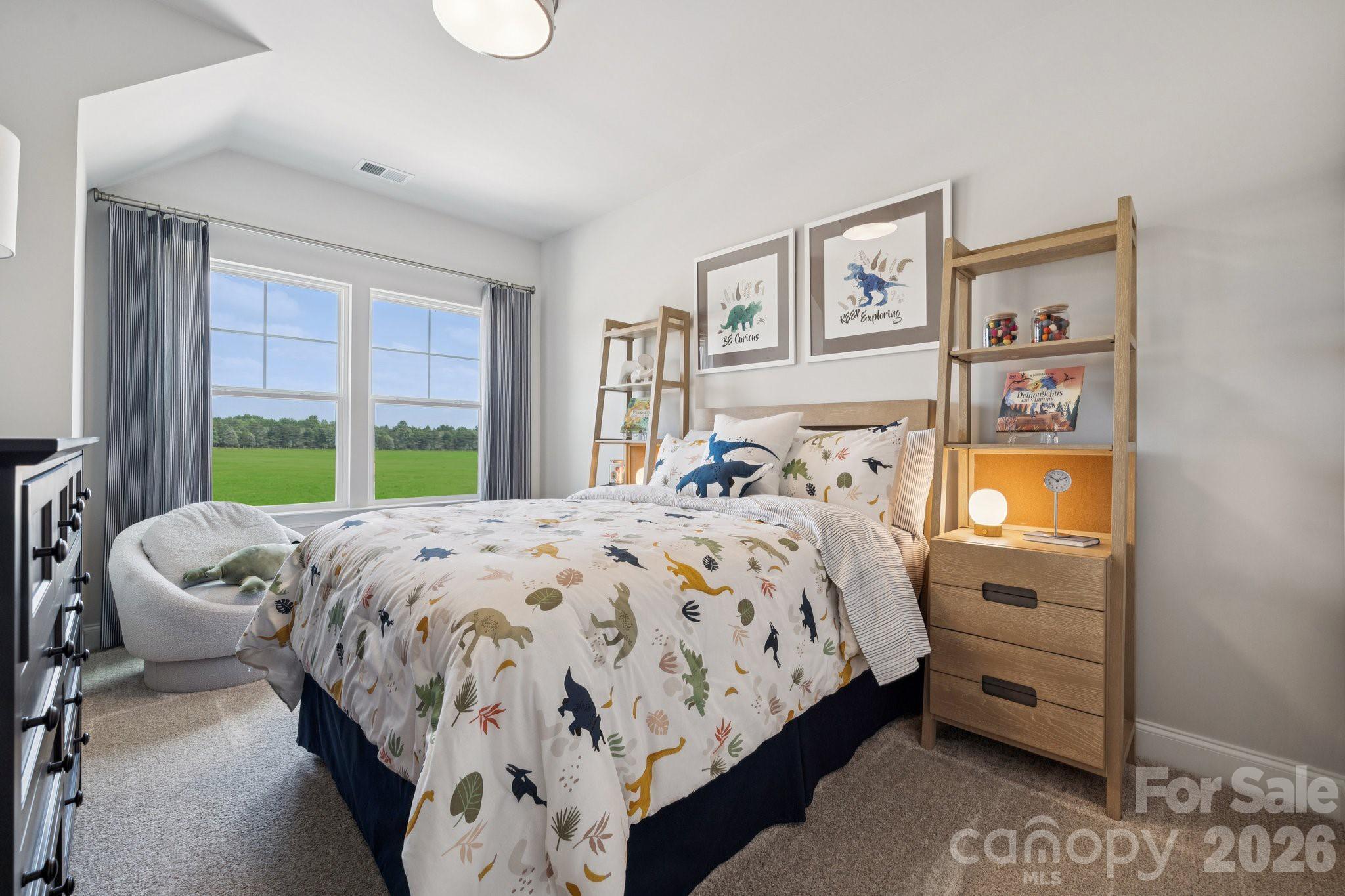 1293 Margo Mannor None Fort Mill Fort Mill, SC 29708 - Photo 13 of 32 a bedroom with a bed and a window