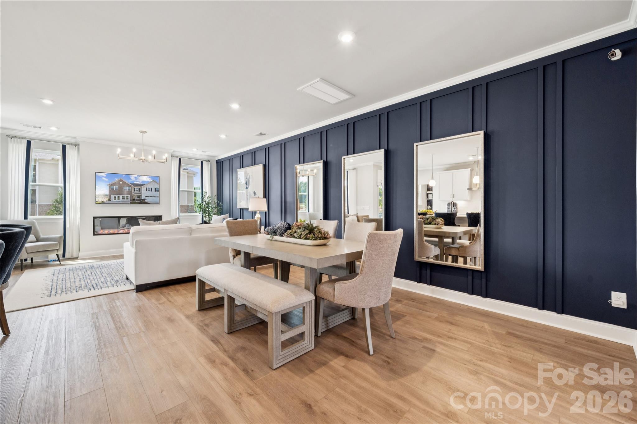 1293 Margo Mannor None Fort Mill Fort Mill, SC 29708 - Photo 20 of 32 a view of a dining room with furniture window and wooden floor