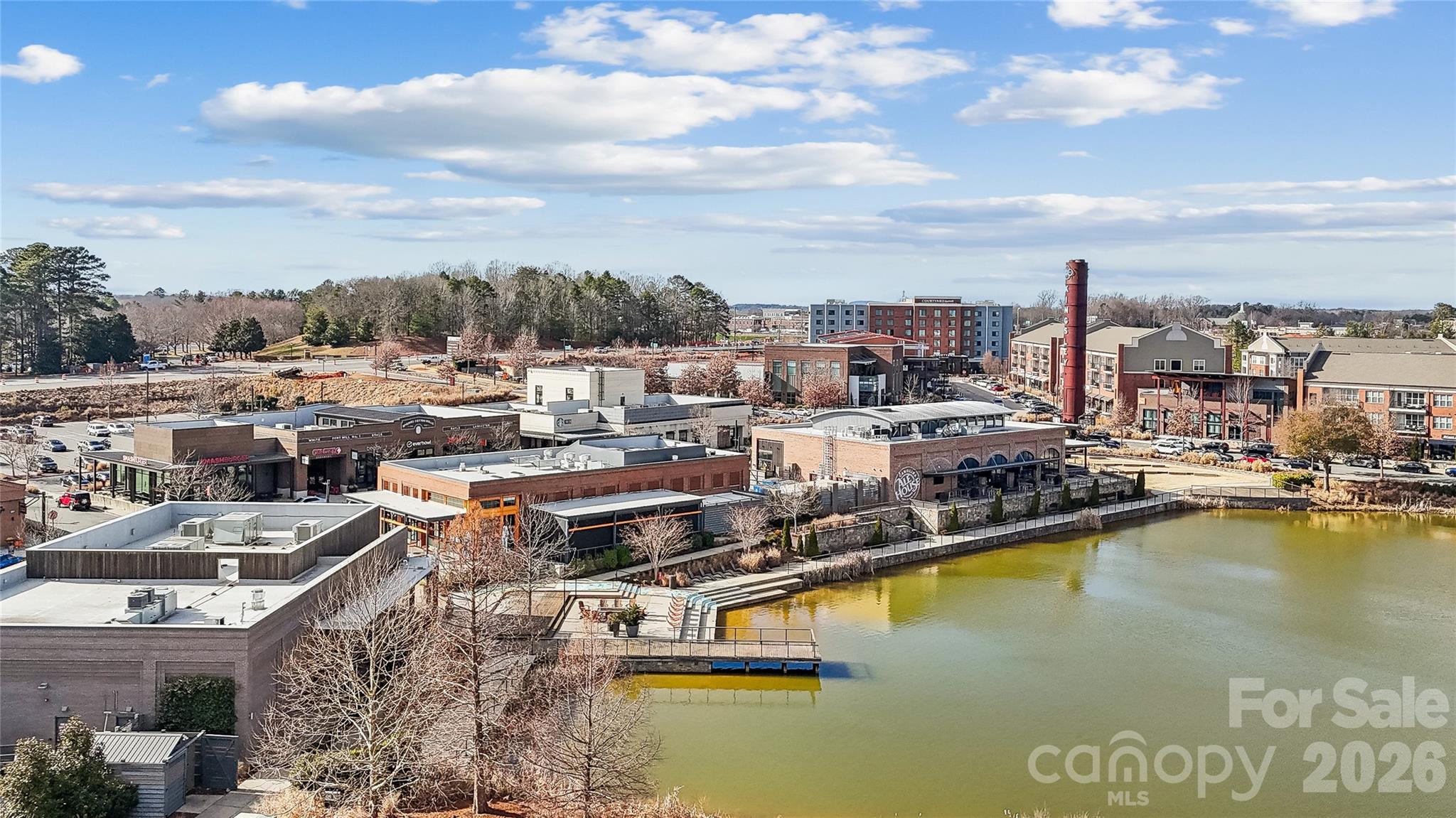 1293 Margo Mannor None Fort Mill Fort Mill, SC 29708 - Photo 30 of 32 a view of a swimming pool with outdoor seating