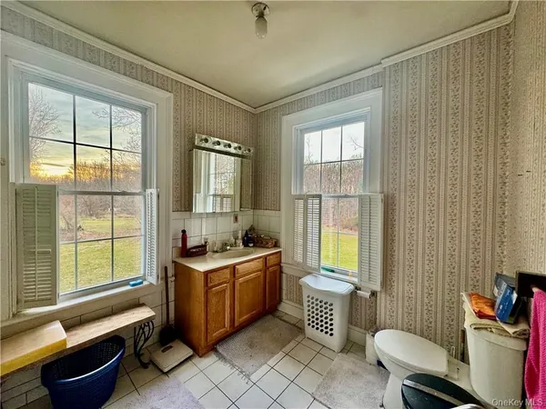 a room with furniture and a window
