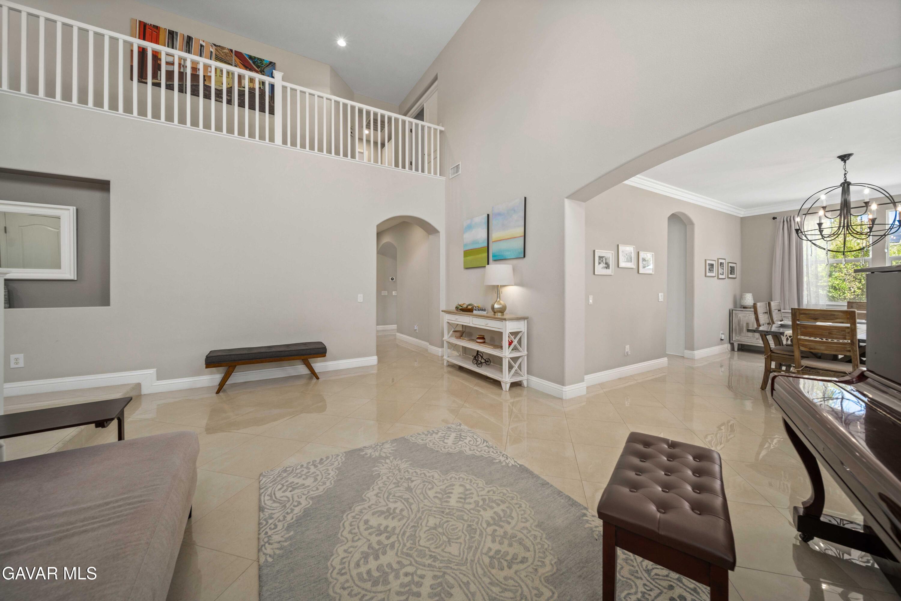26505 Thackery Lane Stevenson Ranch, CA 91381 - Photo 11 of 63 a bedroom with furniture and a rug