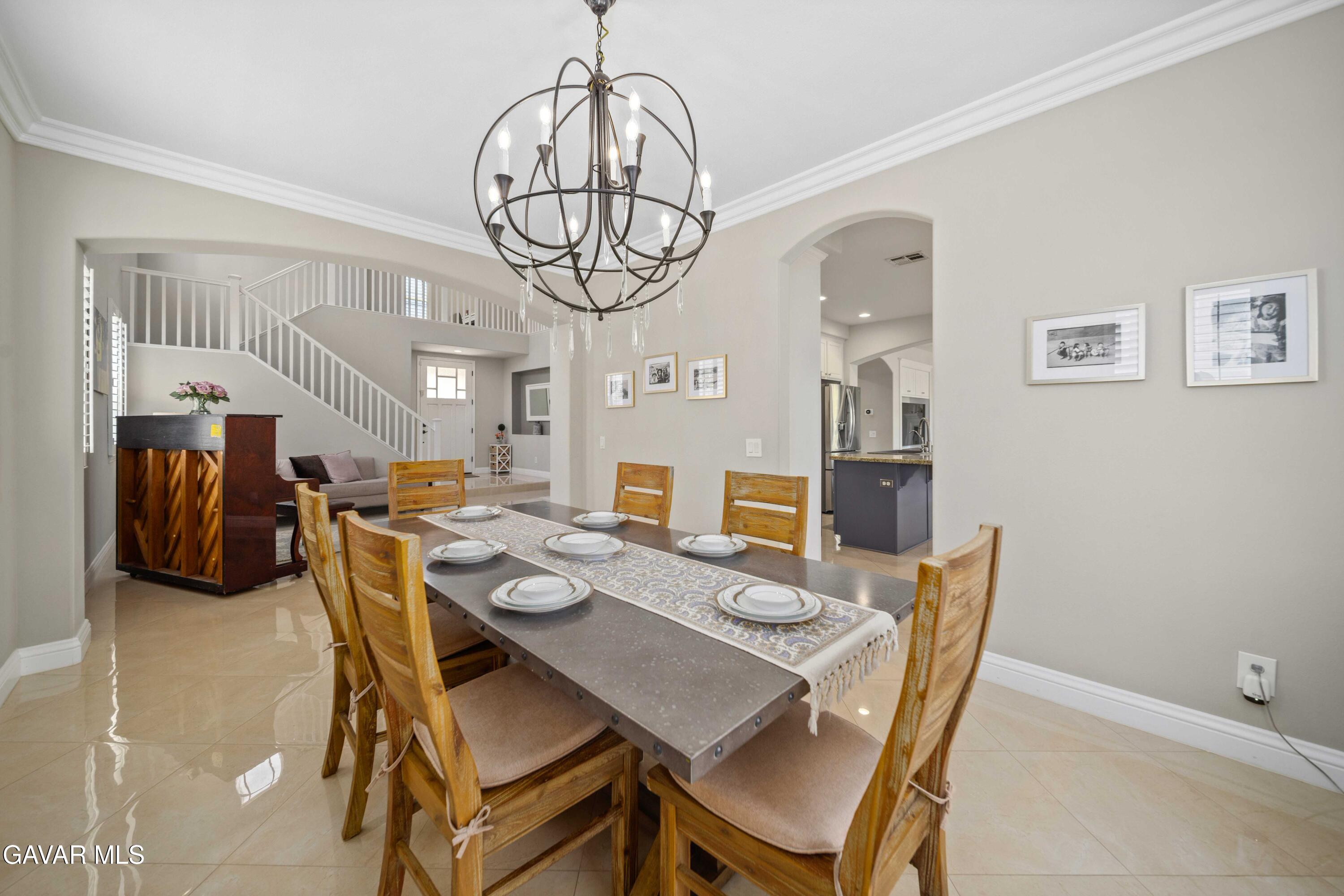 26505 Thackery Lane Stevenson Ranch, CA 91381 - Photo 13 of 63 a view of a dining room with furniture