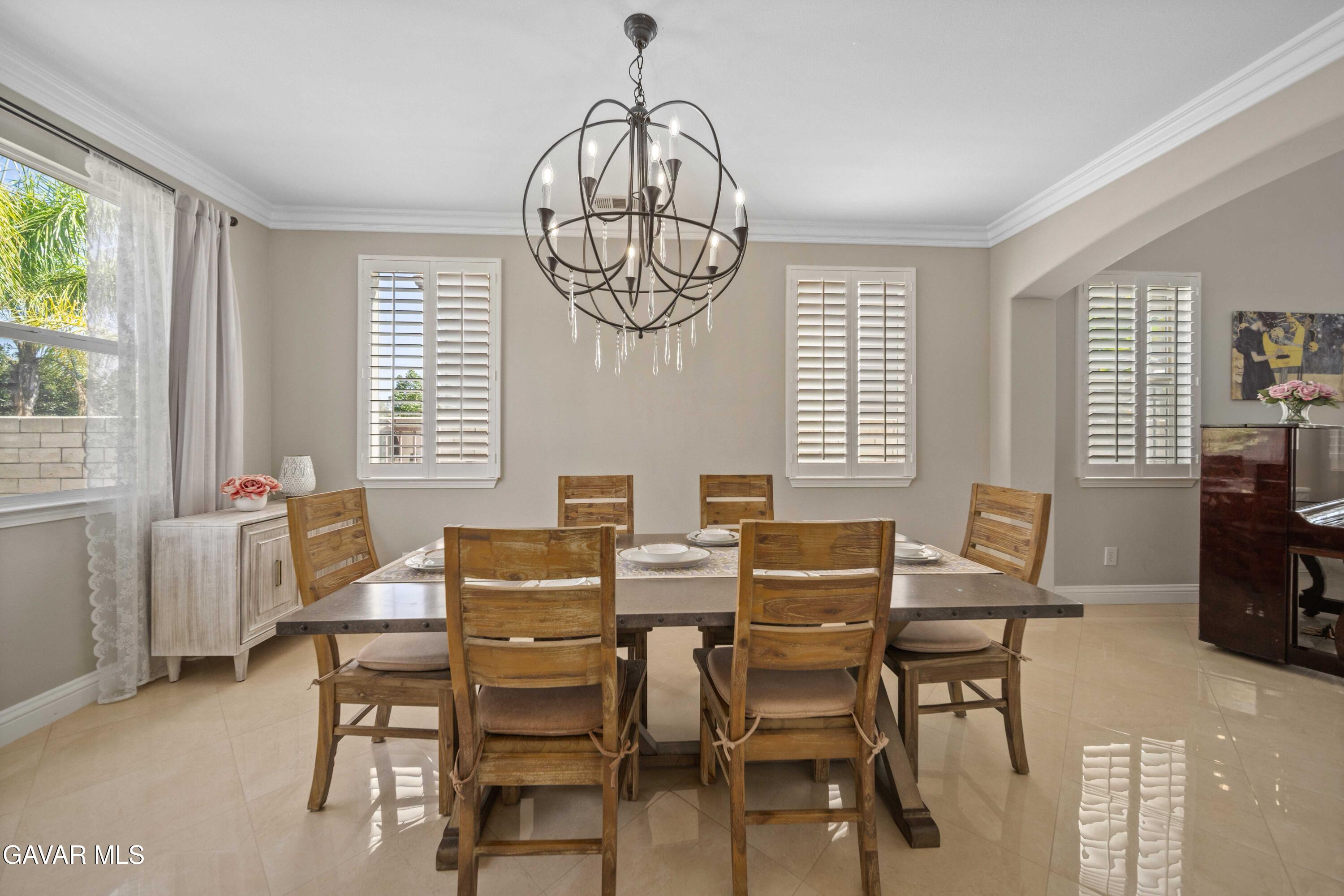 26505 Thackery Lane Stevenson Ranch, CA 91381 - Photo 14 of 63 a view of a dining room with furniture window and outside view