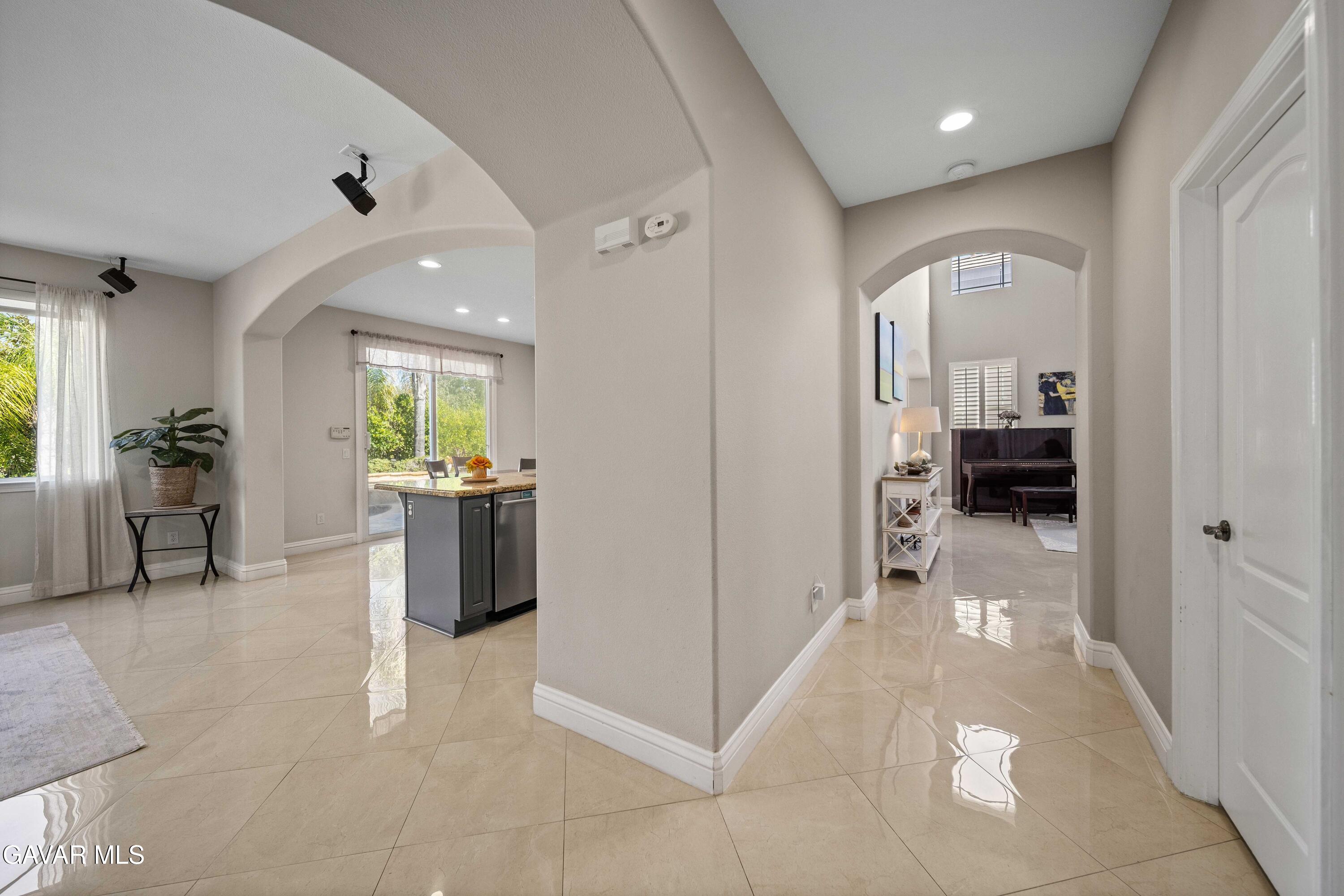 26505 Thackery Lane Stevenson Ranch, CA 91381 - Photo 28 of 63 a view of a hallway view with wooden floor and furniture