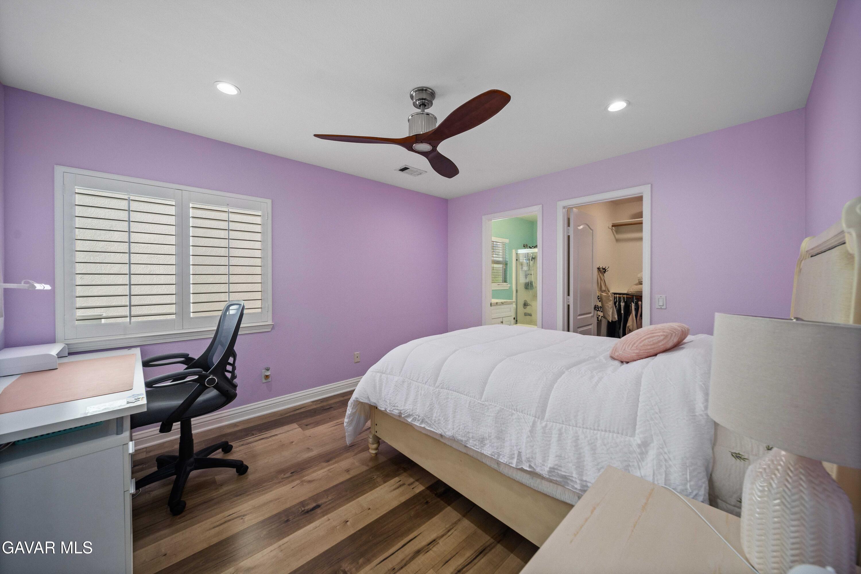 26505 Thackery Lane Stevenson Ranch, CA 91381 - Photo 44 of 63 a bedroom with a bed a desk and chair