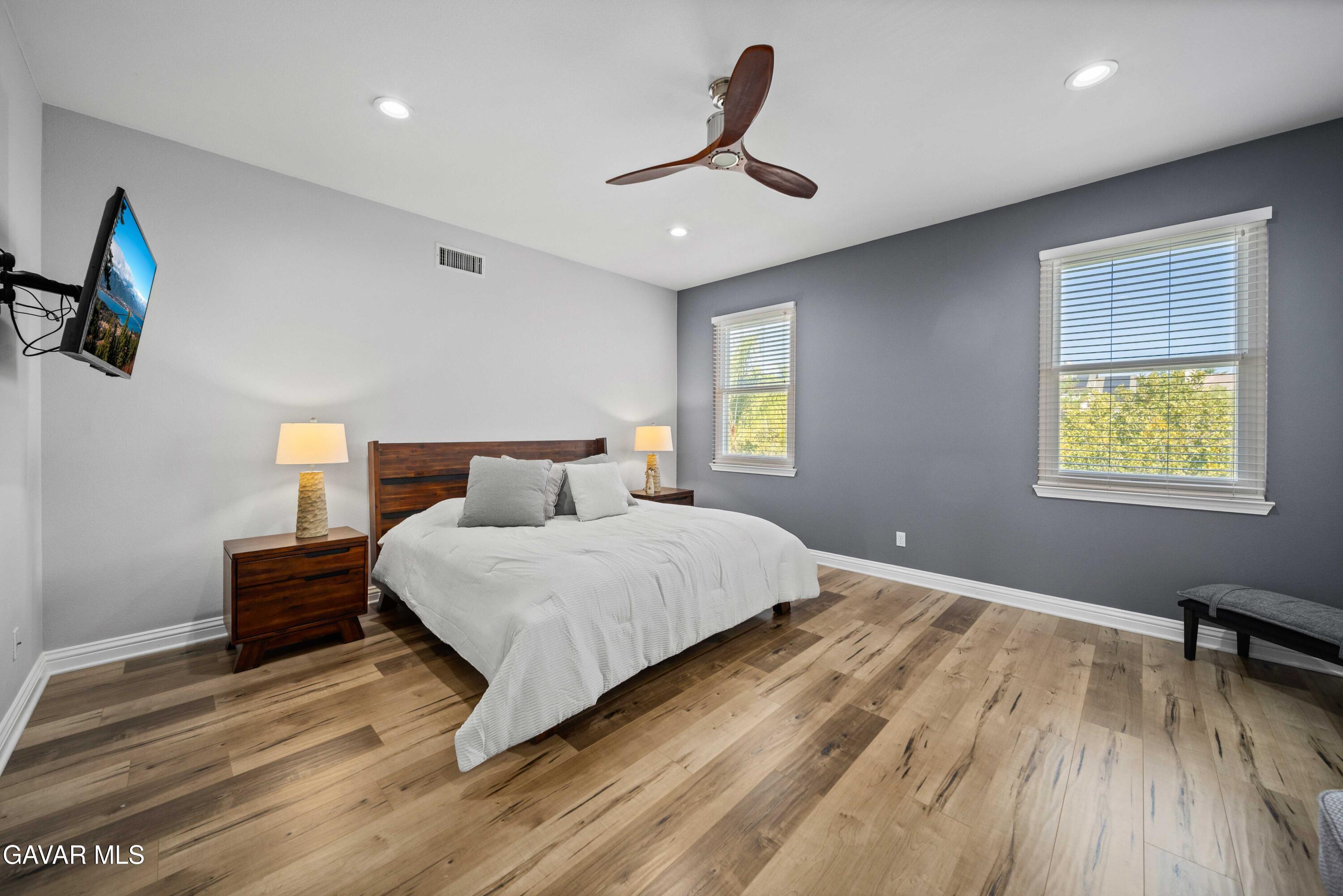 26505 Thackery Lane Stevenson Ranch, CA 91381 - Photo 48 of 63 a bedroom with a bed and a window