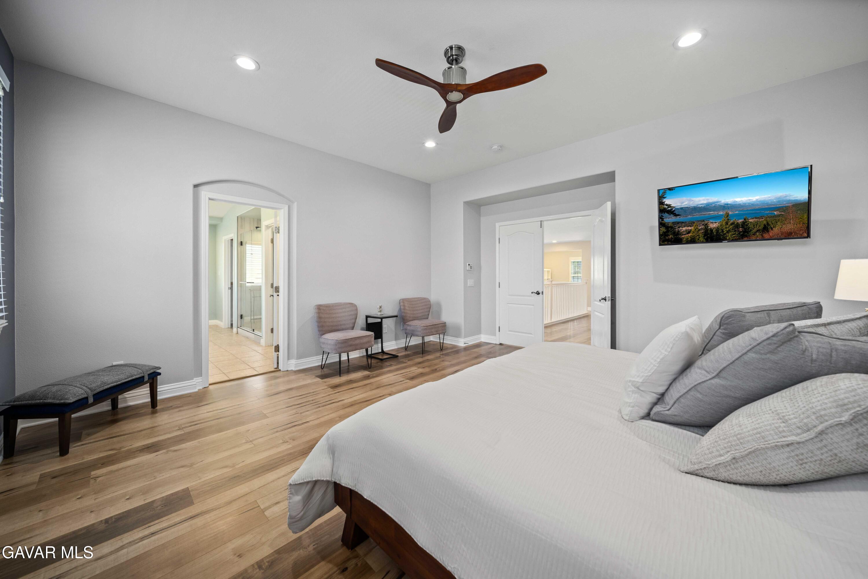 26505 Thackery Lane Stevenson Ranch, CA 91381 - Photo 50 of 63 a bedroom with a bed and a flat screen tv