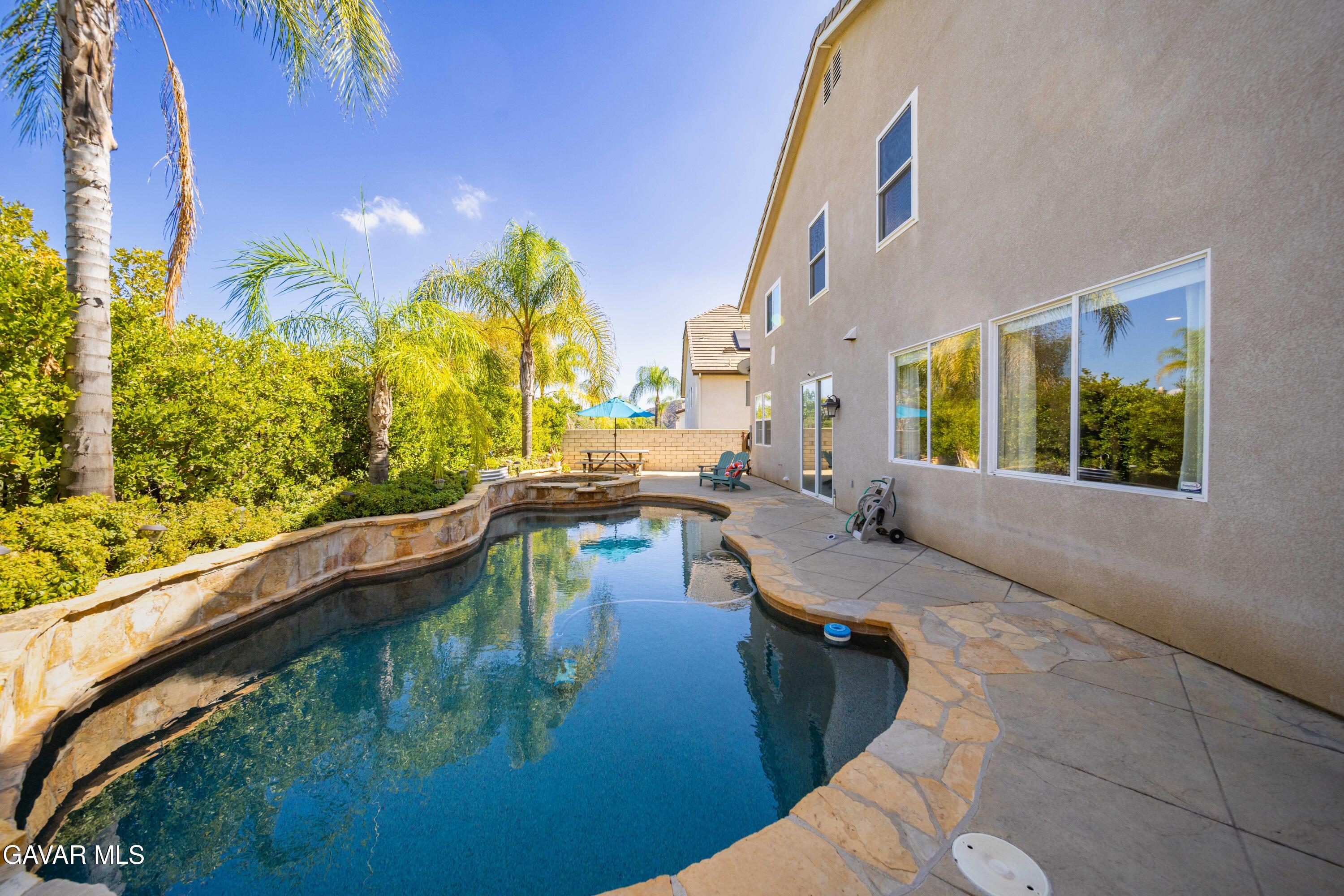 26505 Thackery Lane Stevenson Ranch, CA 91381 - Photo 61 of 63 a view of swimming pool with outdoor seating
