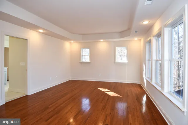 a view of a room with wooden walls