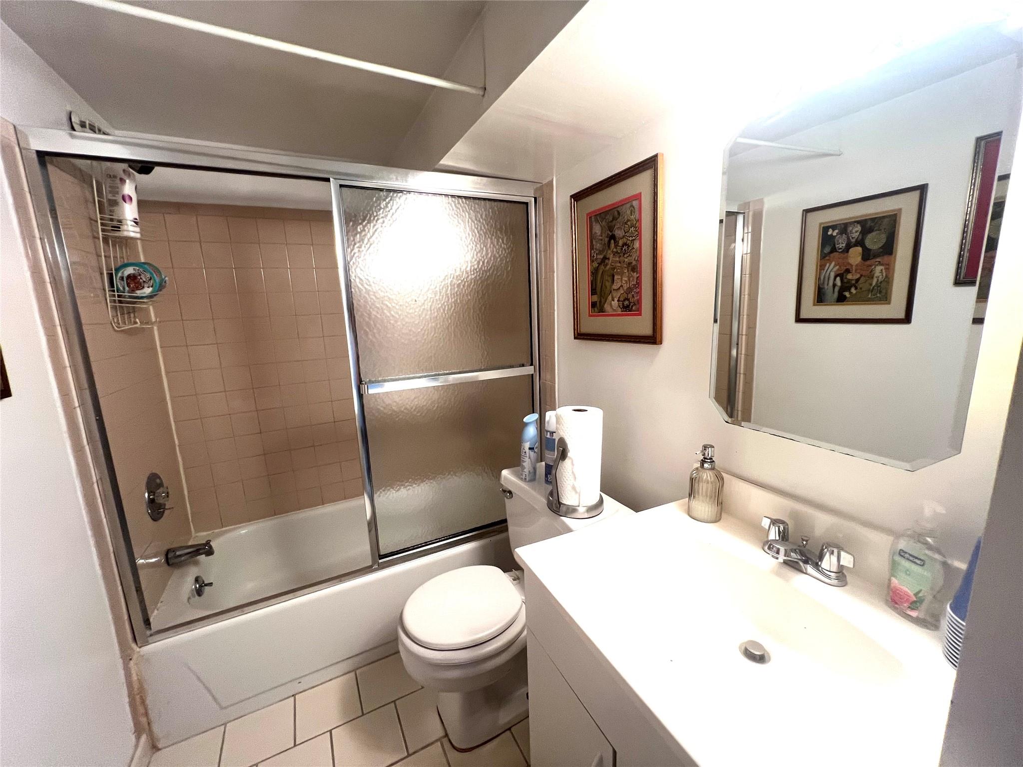 11 Pearl Street Valley Stream, NY 11581 - Photo 12 of 17 a bathroom with a sink toilet and shower