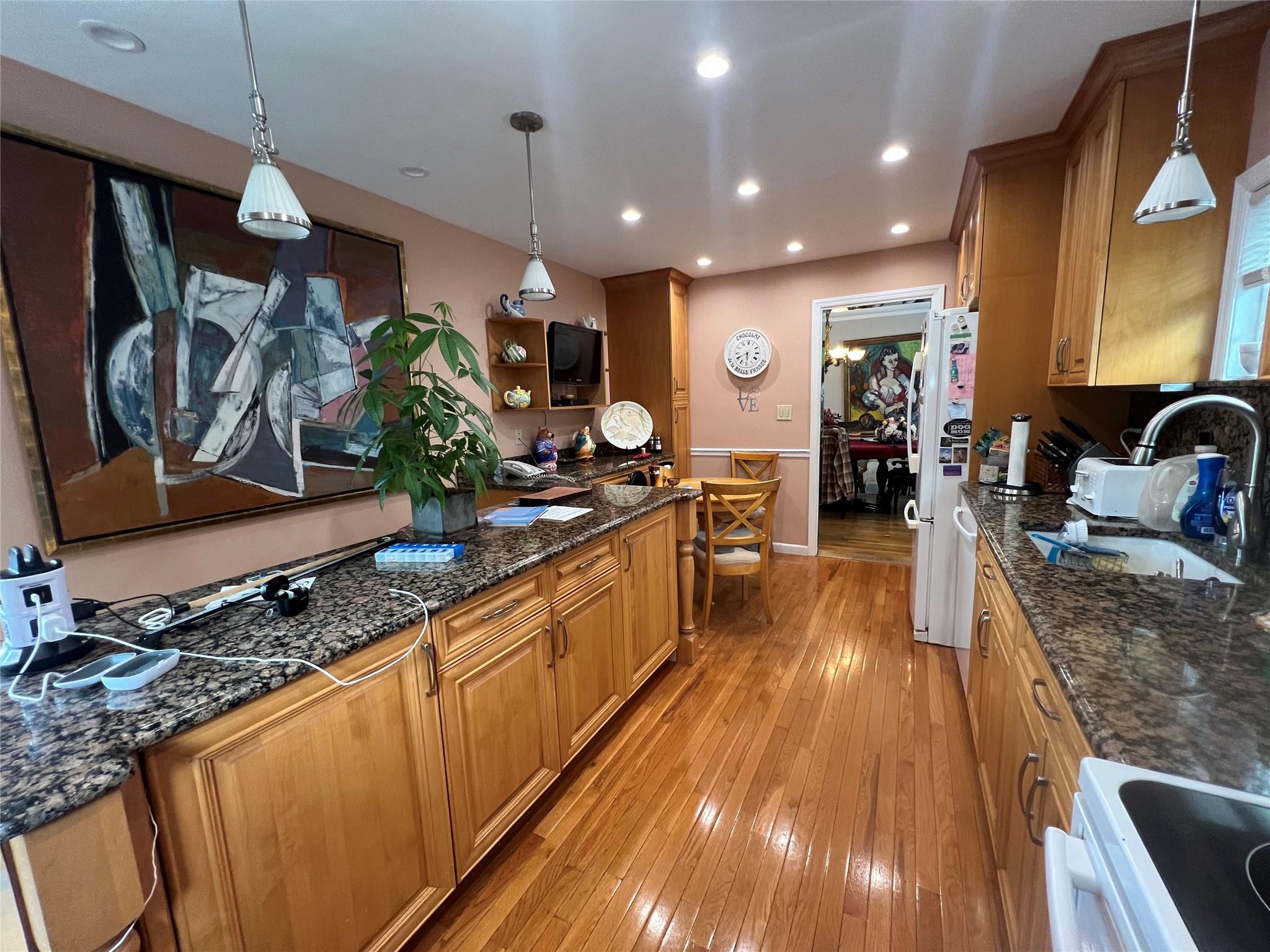 11 Pearl Street Valley Stream, NY 11581 - Photo 5 of 17 a large kitchen with lots of counter space and stainless steel appliances