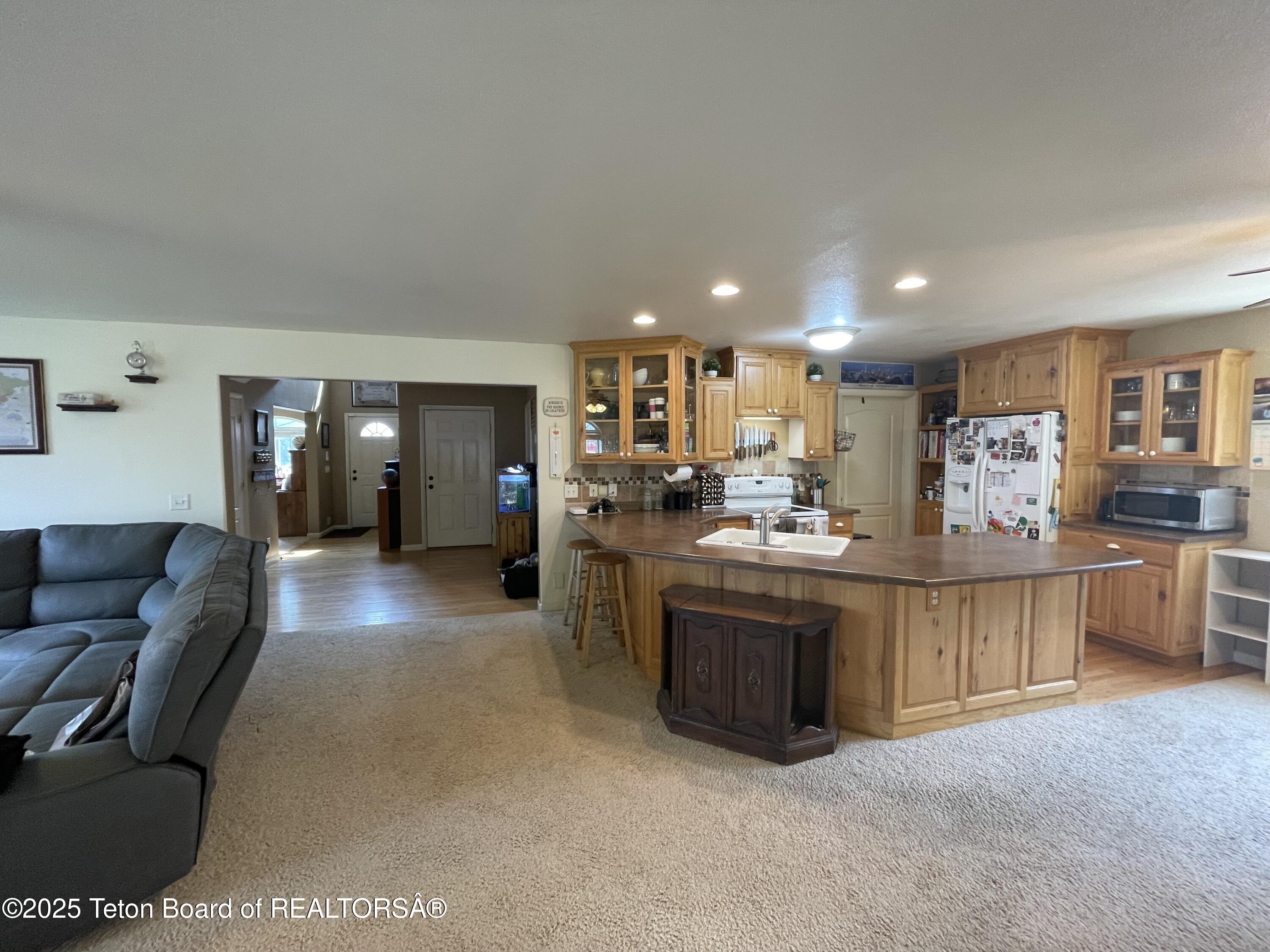417 Grizzly Road Thayne, WY 83127 - Photo 4 of 25 great room 2
