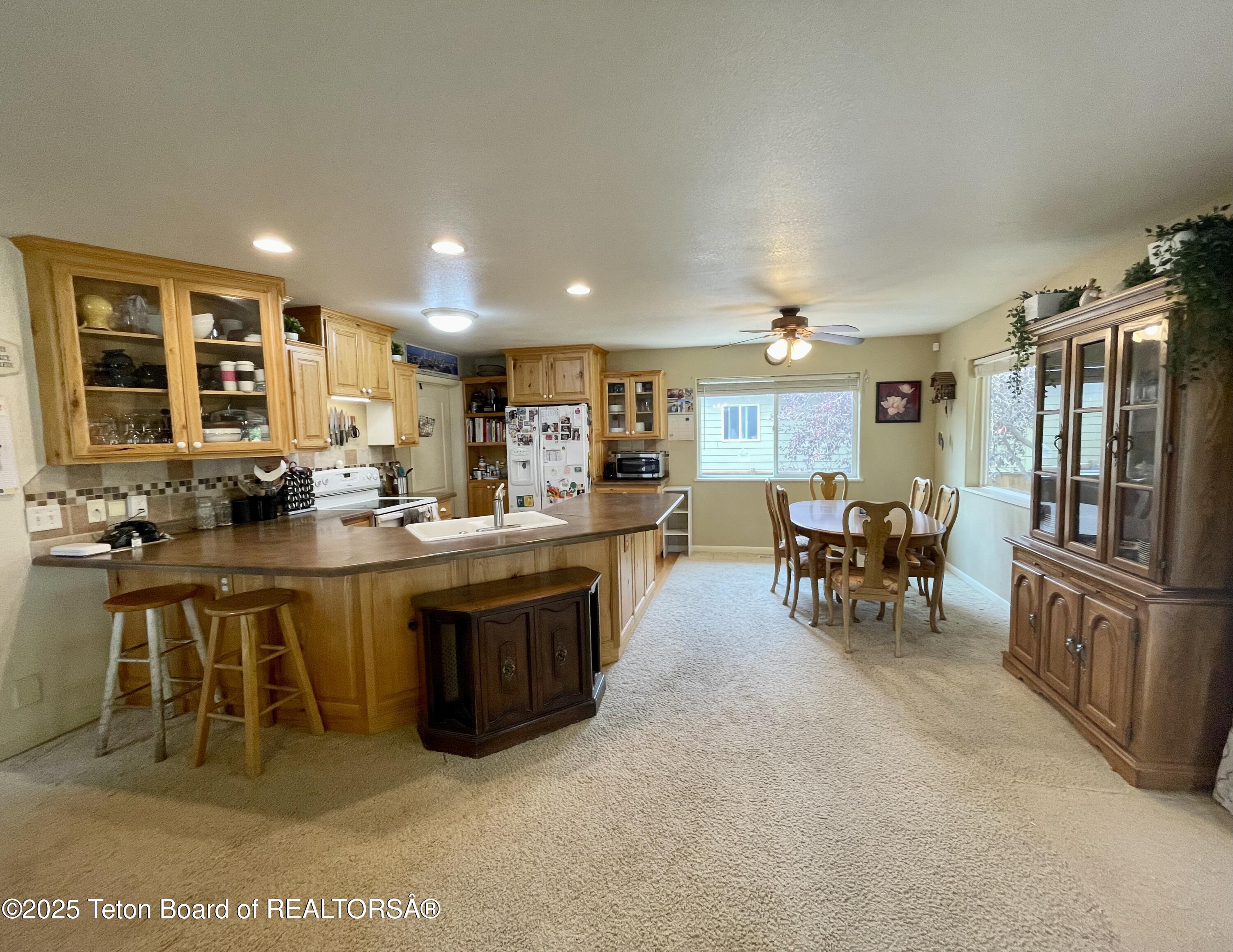 417 Grizzly Road Thayne, WY 83127 - Photo 6 of 25 kitchen-dining