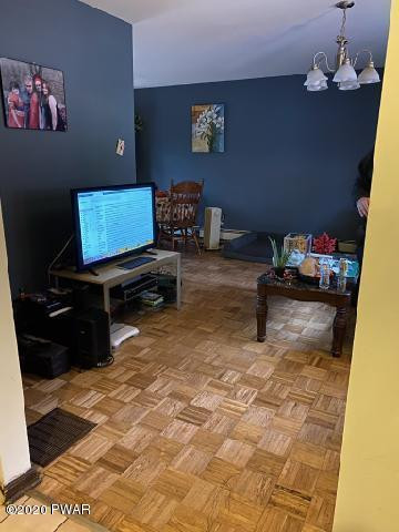 179 Butternut Road Milford, PA 18337 - Photo 5 of 39 a room with furniture and a flat screen tv