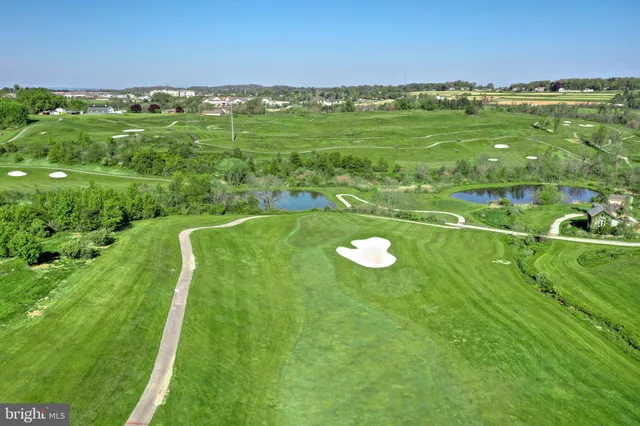 a view of a golf course with a space