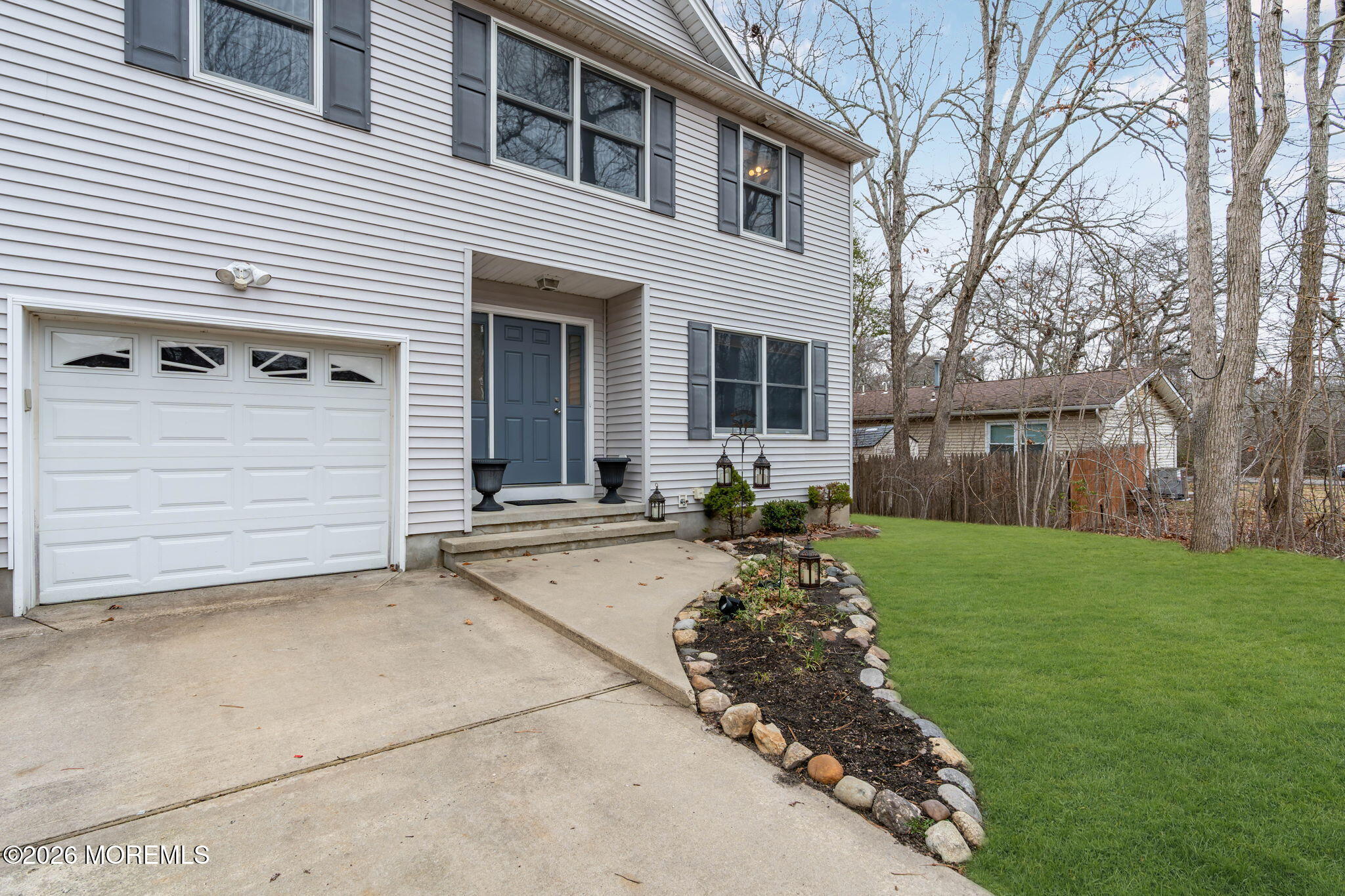 9 Forecastle Way Waretown, NJ 08758 - Photo 46 of 51 a view of a white house with a yard