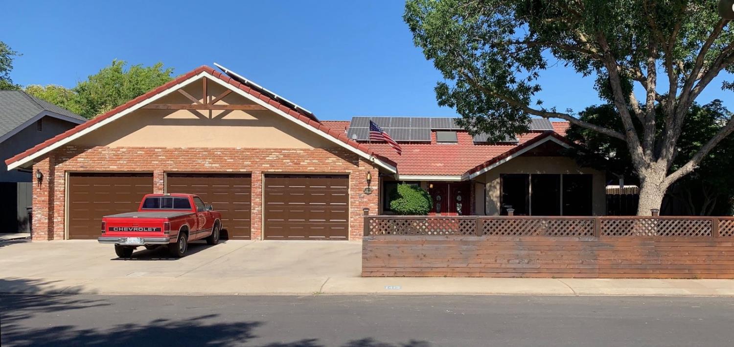a car parked in front of a house
