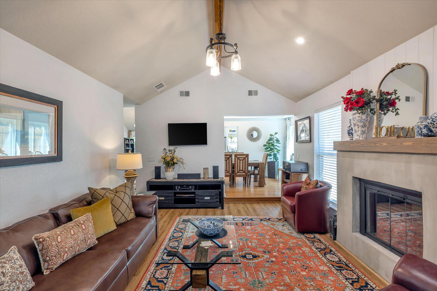 1412 Seneca Place Modesto, CA 95358 - Photo 12 of 62 a living room with furniture and a fireplace