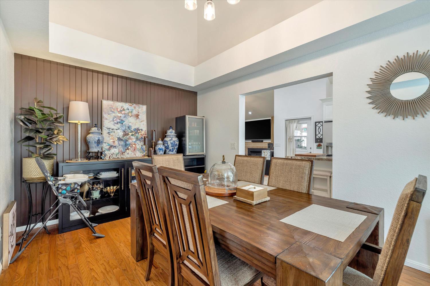 1412 Seneca Place Modesto, CA 95358 - Photo 22 of 62 a view of a dining room with furniture window and wooden floor