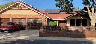 1412 Seneca Place Modesto, CA 95358 - Photo 3 of 62 a front view of a house with a garden