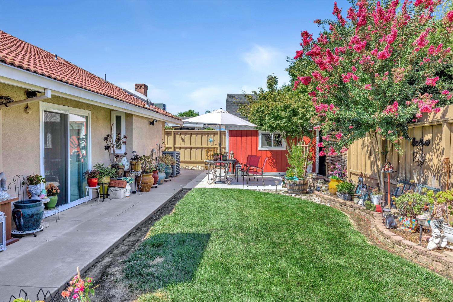 1412 Seneca Place Modesto, CA 95358 - Photo 39 of 62 a front view of a house with patio