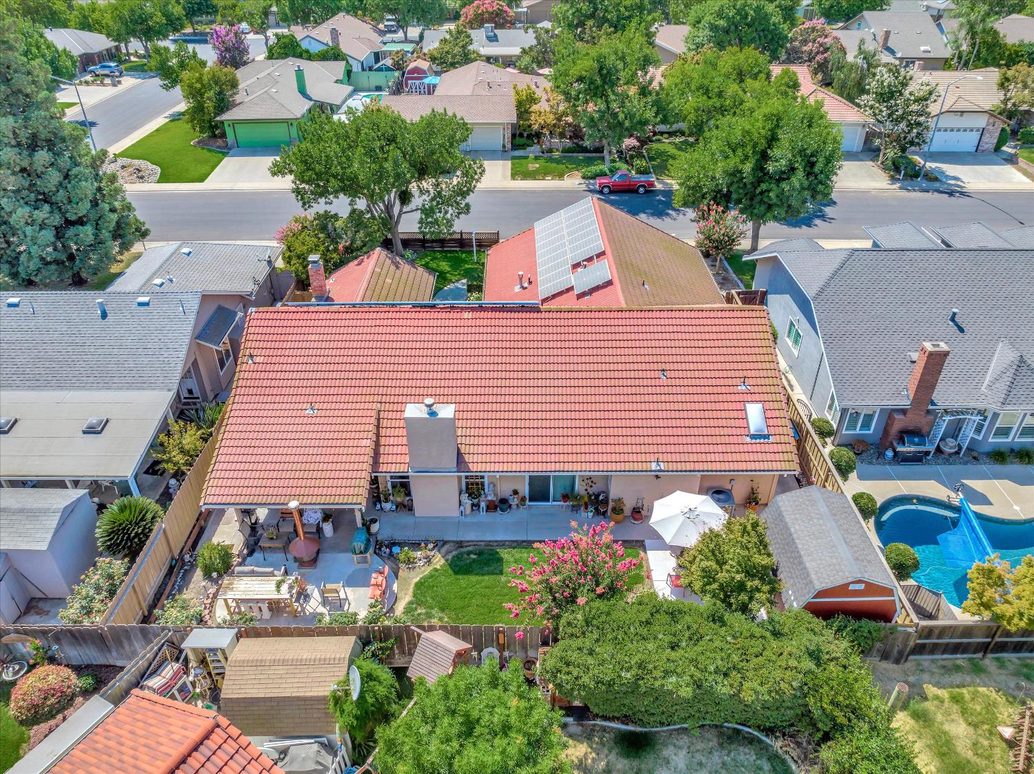 1412 Seneca Place Modesto, CA 95358 - Photo 46 of 62 an aerial view of a house with a garden and plants