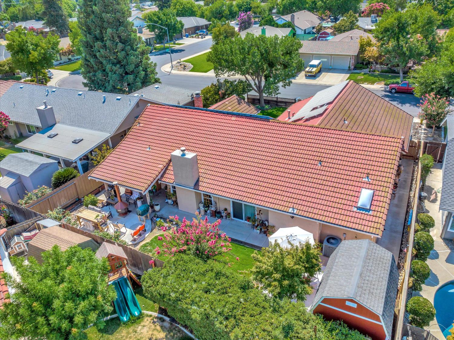 1412 Seneca Place Modesto, CA 95358 - Photo 48 of 62 a view of a patio with table and chairs and potted plants