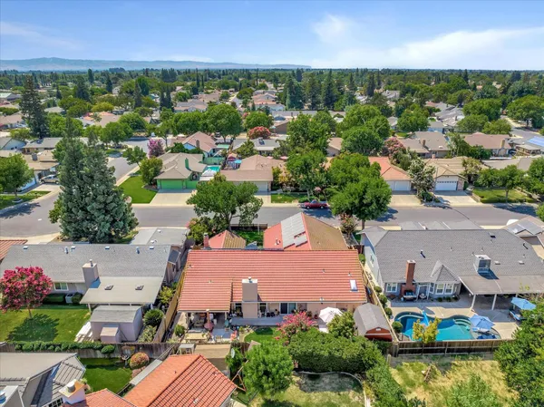 an aerial view of a city with lots of residential buildings