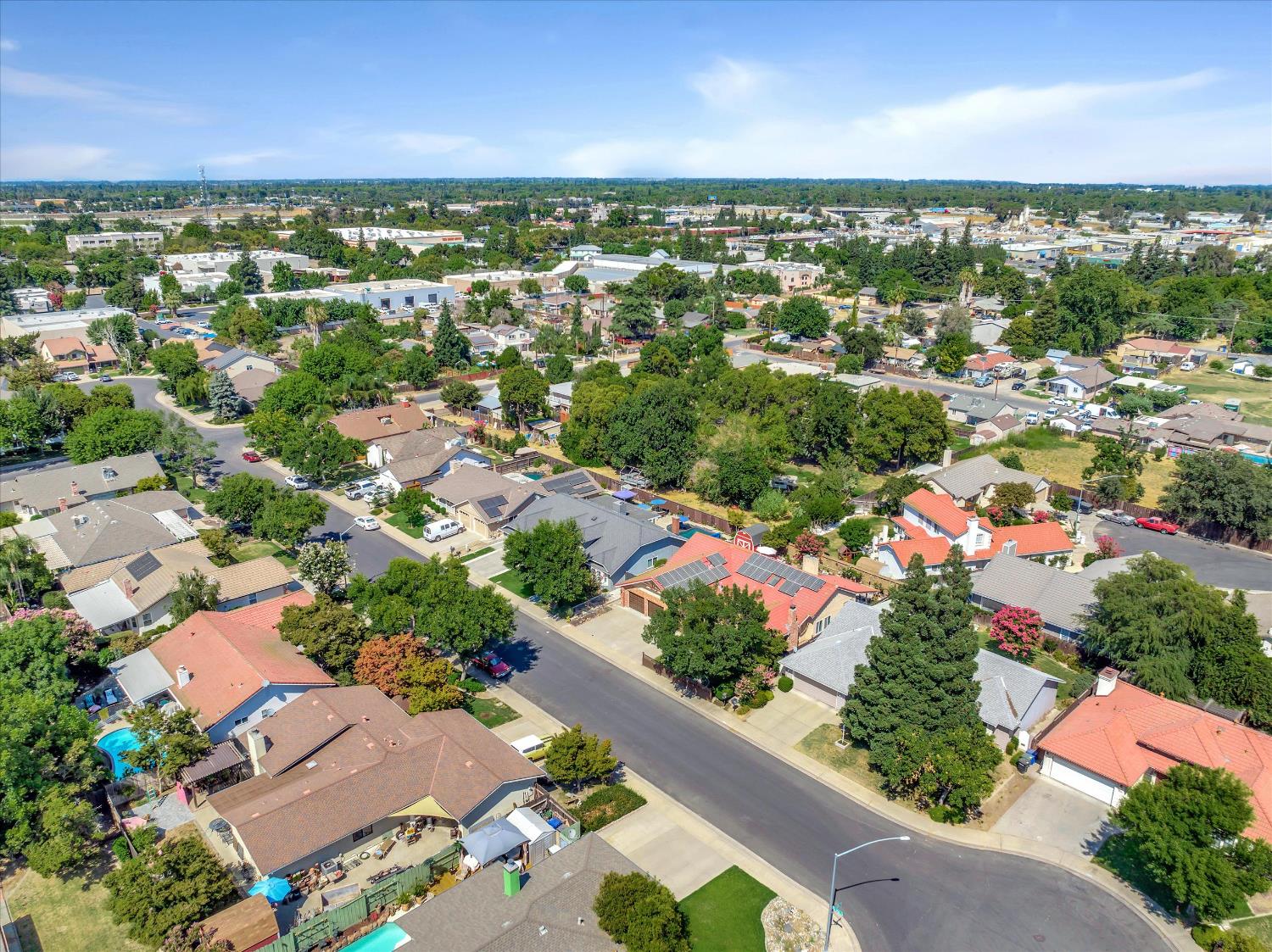 1412 Seneca Place Modesto, CA 95358 - Photo 56 of 62 an aerial view of residential houses with outdoor space and trees
