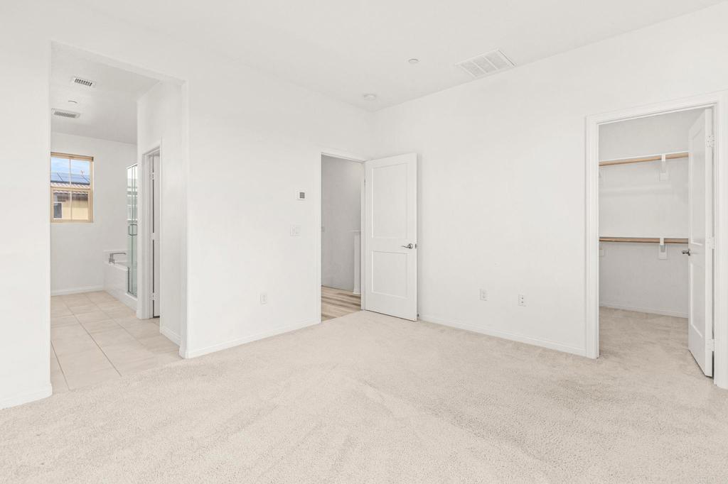 1609 Holly Leaf Way Oceanside, CA 92056 - Photo 13 of 26 an empty room with an entryway