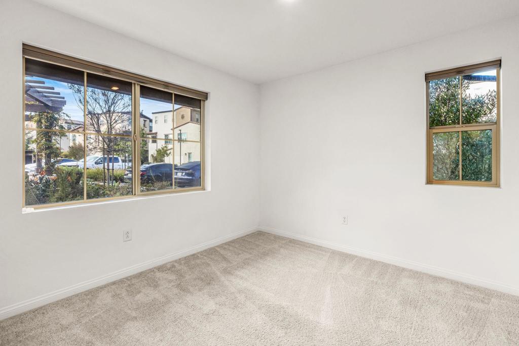 1609 Holly Leaf Way Oceanside, CA 92056 - Photo 21 of 26 an empty room with a window