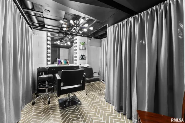 a view of a chairs and table in a balcony