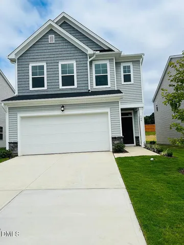 a front view of house with yard