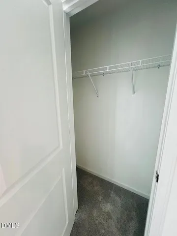 a bathroom with a sink a toilet a mirror a bathtub and shower