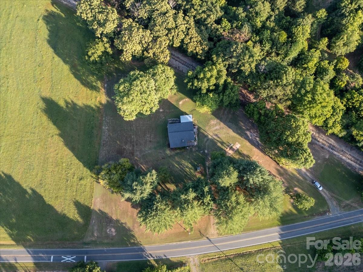 12282 Coyle Road Stanfield, NC 28163 - Photo 2 of 24 a view of a yard